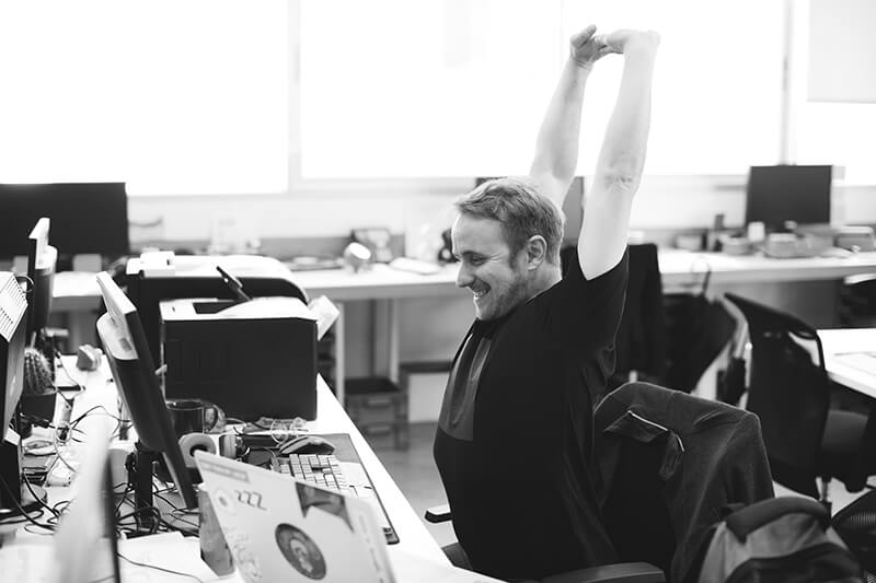 Excited man in call center